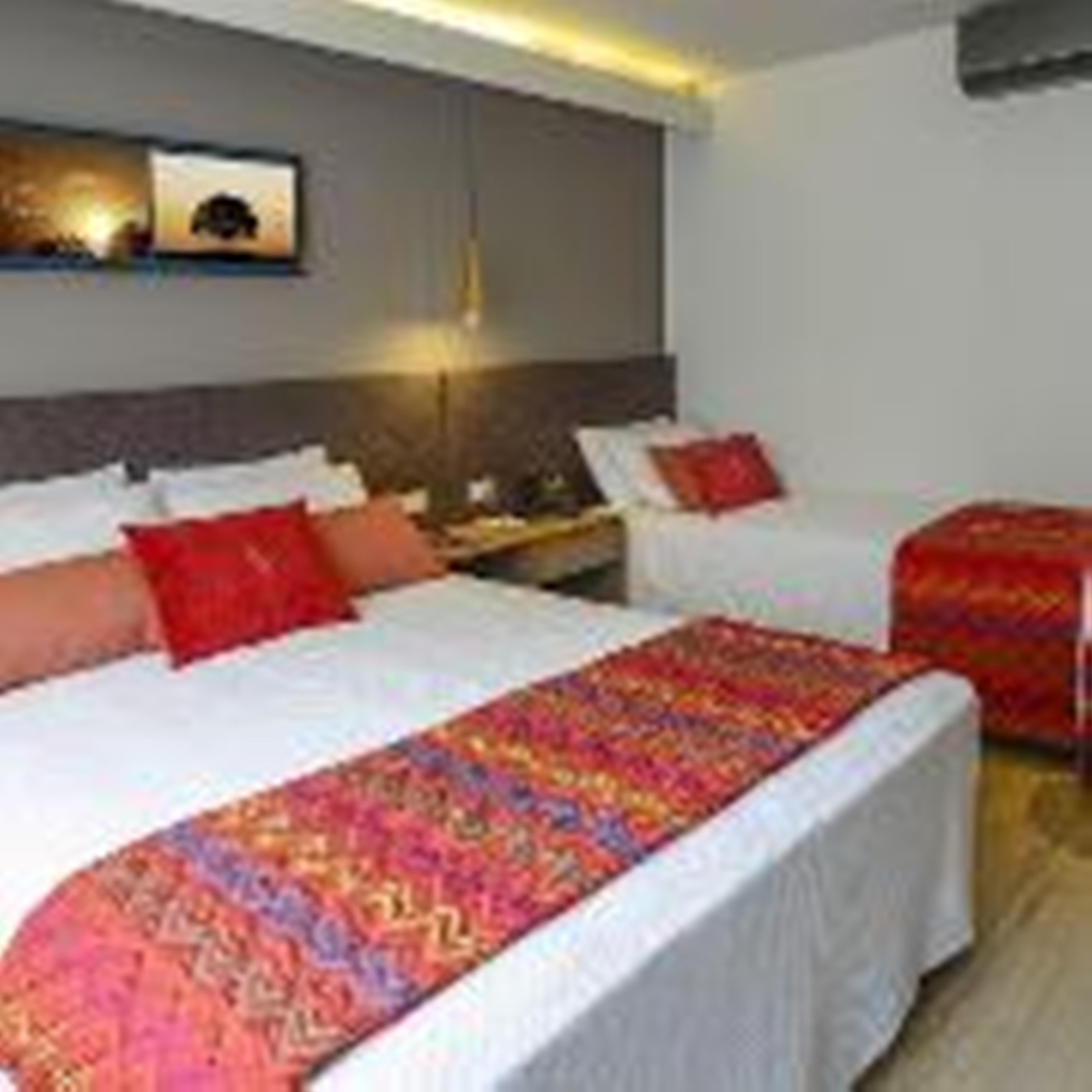 Hotel Laghetto Stilo Centro Gramado Exteriör bild A bed runner
